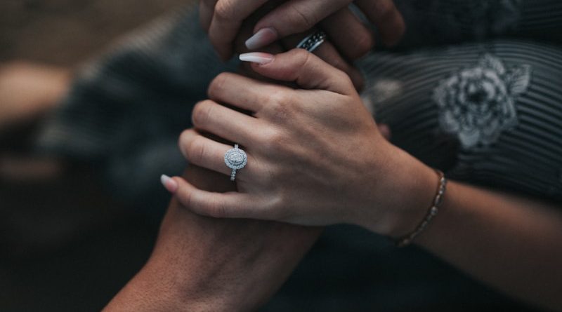 man and woman holding each others hands